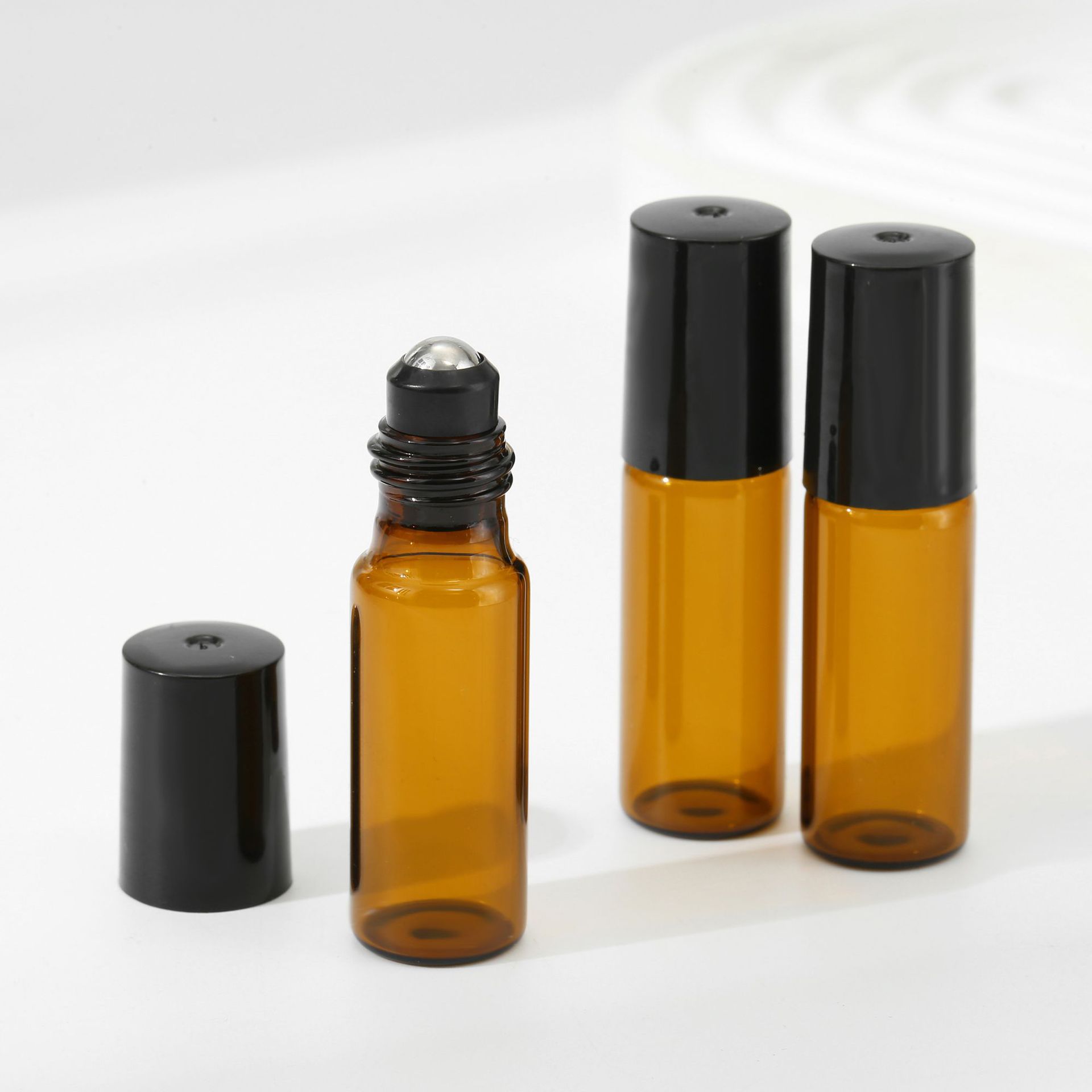 Botella de bola cosmética de 2 ML 3 ML 5 ML 10 ml botella de perfume de vidrio muestra pequeña botella vacía botella de aceite esencial portátil de color marrón embotellado