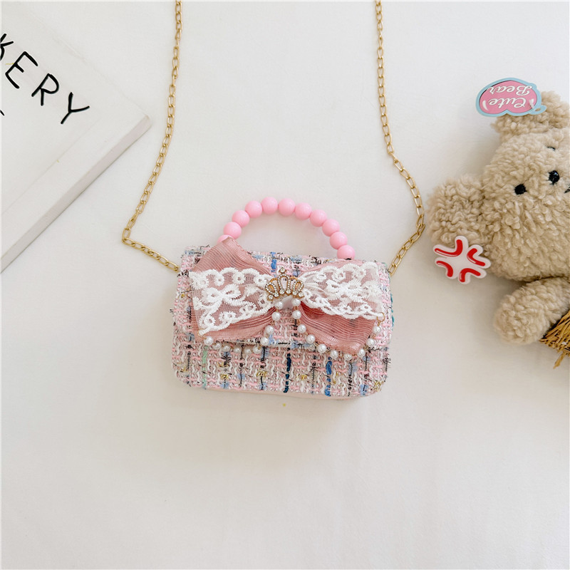 2024 nueva moda lindas bolsas de hombro para niños bolsas de perlas a cuadrícula bolsas extranjeras bolsas de hombro para niñas gran capacidad marea