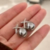 2503218A Gray Pearl Cross Zircon