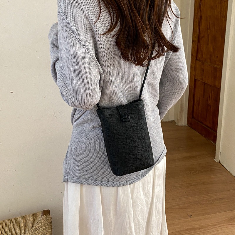 Nuevo mochila ligero verano 2026 teléfono móvil cuero suave versátil cubo de transporte mini mochila de hombro mujer estilo coreano