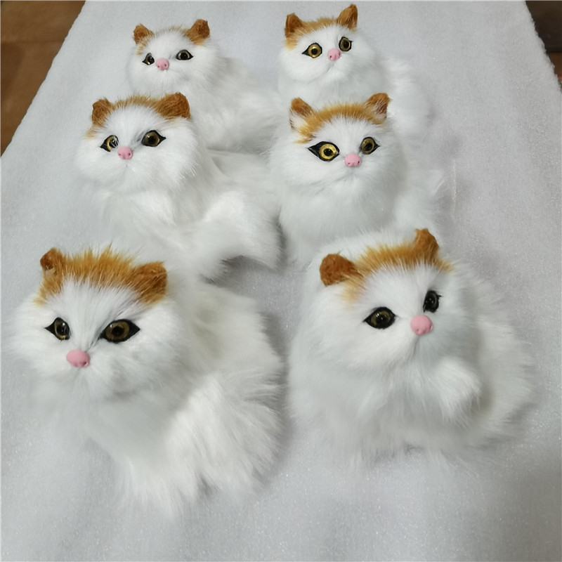 シミュレーション花かご猫は猫動物シミュレーション毛皮の置物観光地区の露店で子供のおもちゃのプレゼントを販売します。|undefined