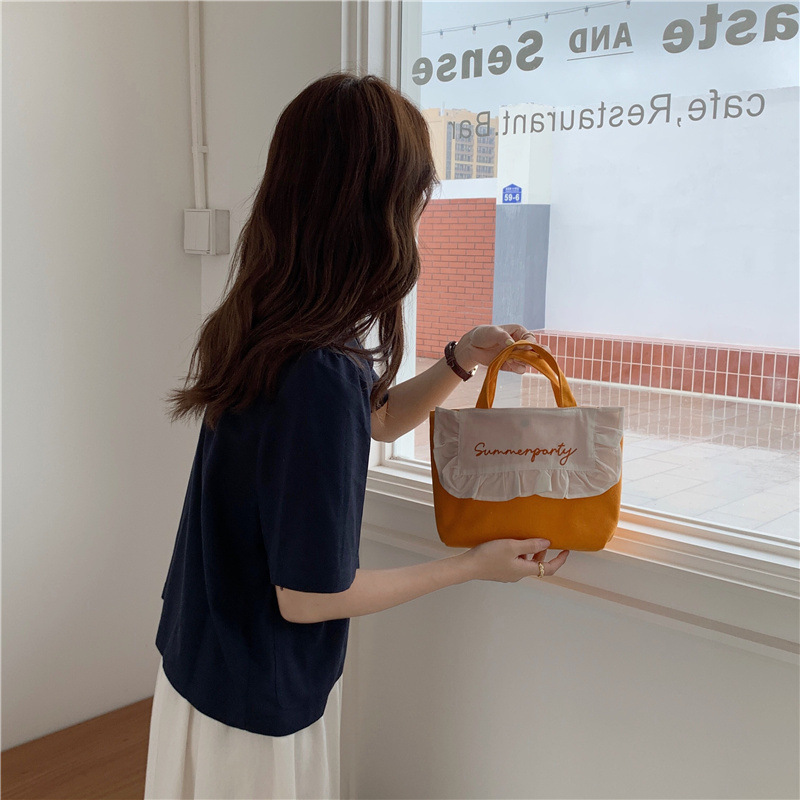 1441 Japanese and Korean chic Sweet ruffled bento Bag, Fresh embroidered hand-held small cloth bag, girl student bag wholesale undefined