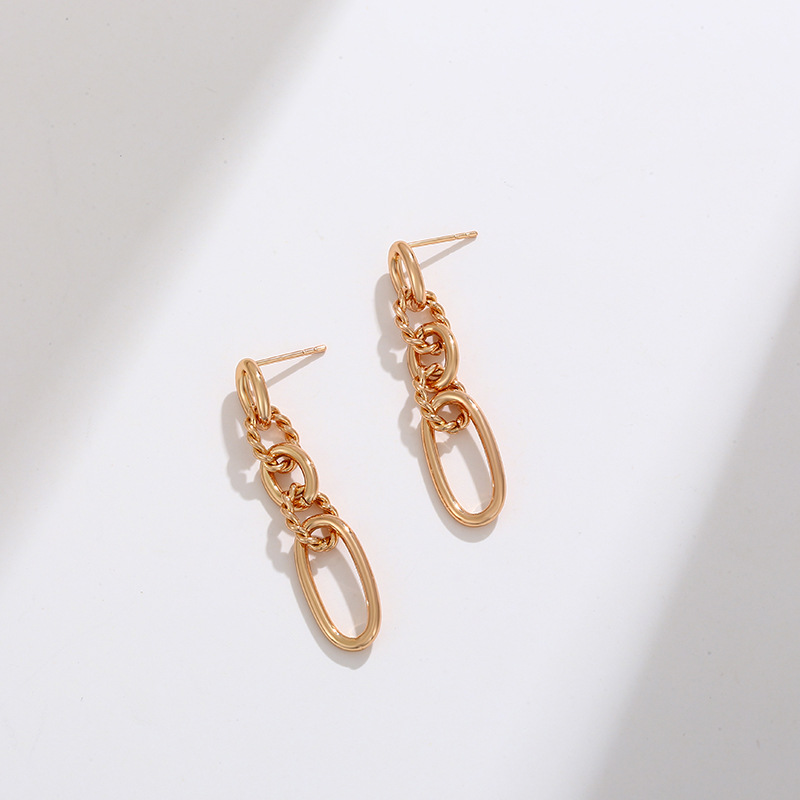 Pendientes de aleación Xuping de estilo europeo y americano, pendientes largos ovalados retorcidos, joyería de moda de alta gama para mujer al por mayor