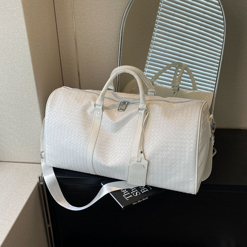 Bolso de viaje de cuero tejido de PU transfronterizo bolsa de equipaje de gran capacidad de corta distancia bolsa de gimnasio de yoga de mensajero de todo fósforo