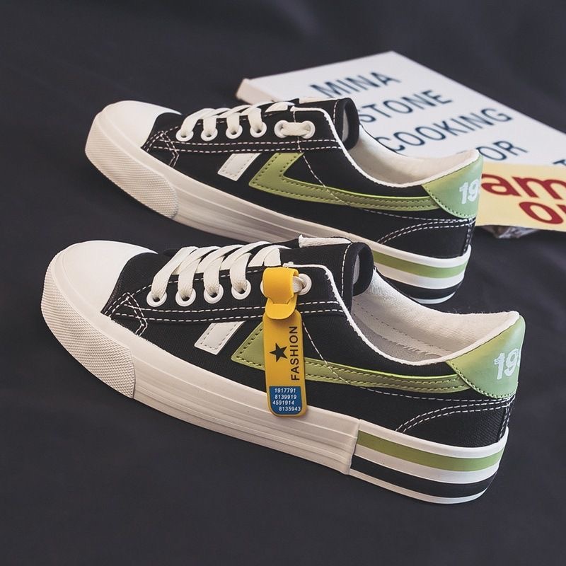 Zapatos blancos de primavera y otoño para mujeres zapatos de lona de altura baja primavera 2026 nuevos estudiantes coreanos zapatos de goma transfronterizos transfronterizos