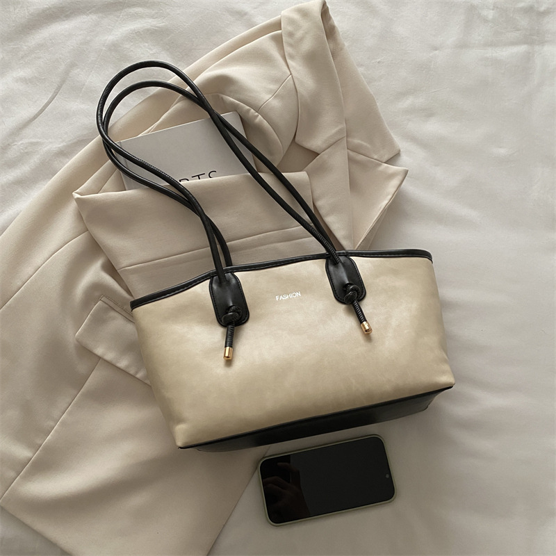 Bolsos retro de alta calidad de gran capacidad para damas 2024 nuevo bolso de hombro de viaje de otoño e invierno bolso portátil