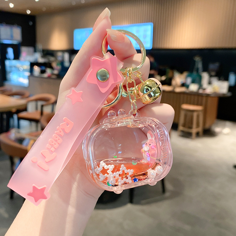 Linda bolsa de fresa de aceite llavero de conejo exquisito colgante de botella de deriva colgante de bolsa de coche colgante pequeño regalo al por mayor