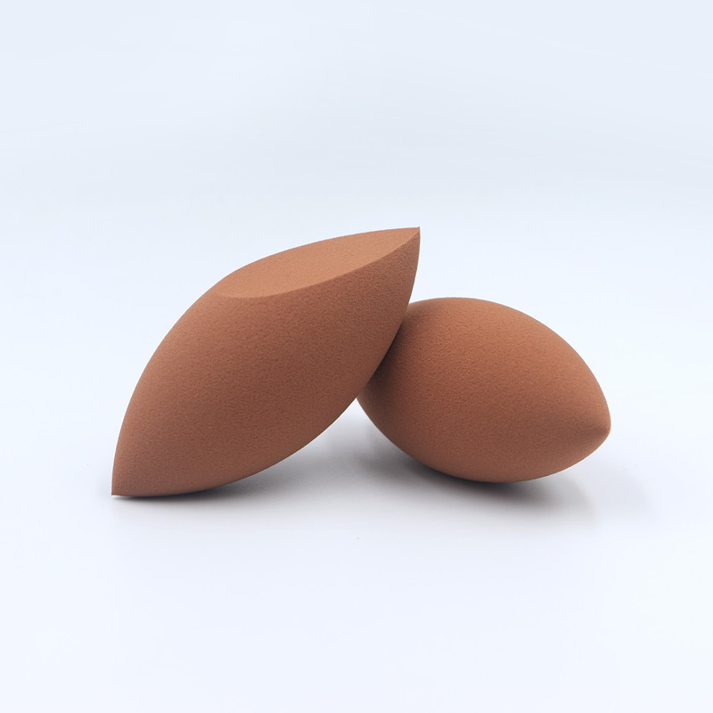 Huevo de maquillaje de corte oblicuo en forma de oliva puntiagudo sin látex mojado y seco de doble uso huevo de maquillaje en forma especial algodón de soplo de calabaza grabado LOGO