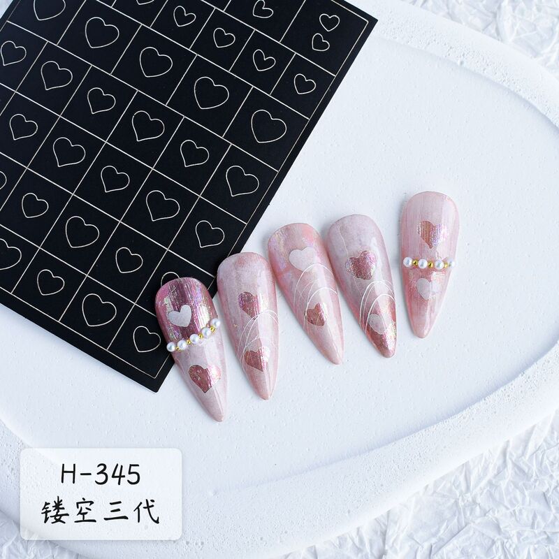 ネイル用品の透かし彫りのネイルアートのスプレーのテンプレートのステッカーの3世代のステッカーの透かし彫りの蝶の愛の爪のステッカーの卸売り|undefined