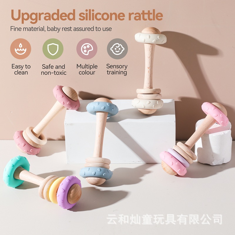 El nuevo sonajero de mano de silicona de madera de Amazon, el bebé puede agarrar la educación temprana