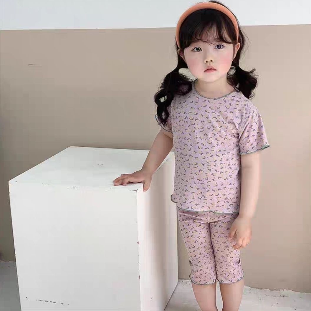 Verano nueva ropa de seda de hielo ropa para niños ropa de hogar para niños y niñas traje de moda de dos piezas conjunto de ropa de aire acondicionado para niños medianos y pequeños