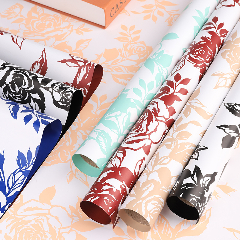 Huaxi Qixi historia del día de San Valentín rosa impresa película impermeable red papel de embalaje de flores ramo de flores papel de embalaje floral