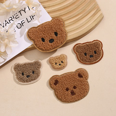 ぬいぐるみの熊の服装の服帖の服装の補助材料の卸売りのタオルの刺繍のコンピュータの刺繍の補助材料の新型の補助金