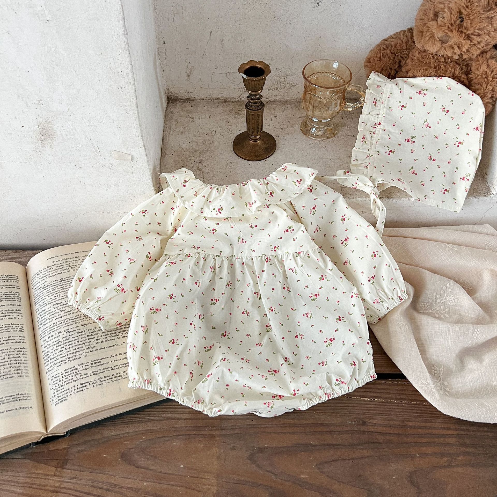 Estilo coreano niñas bebé Lotus collar floral con capucha mameluco ins recién nacido algodón suelto mono triángulo escalada