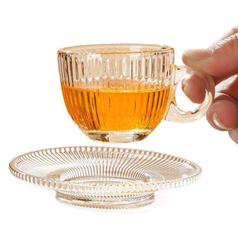 Juego de tazas y platillos de café de vidrio transfronterizo Taza de café con leche americana Taza de té transparente resistente al calor Taza de café de lujo europea