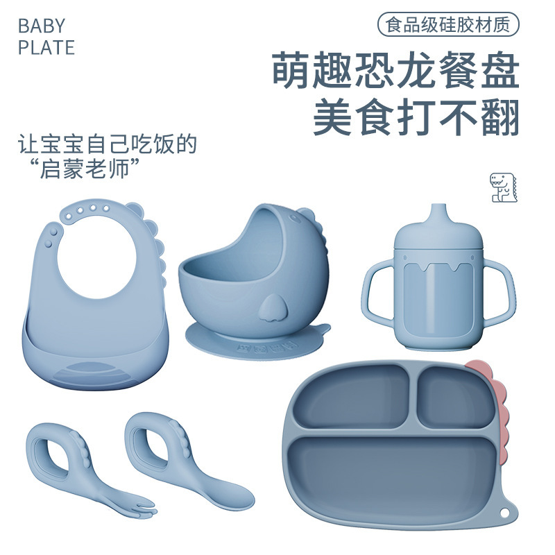 Cuchara de bebé de venta caliente transfronteriza, vajilla para bebés y niños, cuchara de alimentos, tazón de alimentos, juego de vajilla de silicona de dinosaurio de dibujos animados