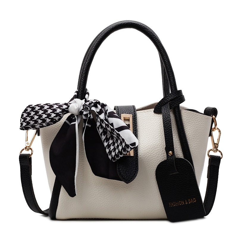 Comercio exterior explosivo bolso de cestas de verduras de mano mujer 2025 nuevo bolso de cinturón simple estilo coreano bolso de cubo de nicho