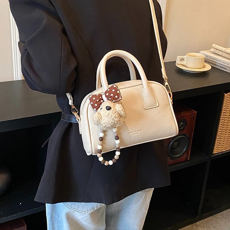 Bolsa de brazo retro nicho para mujeres 2026 nueva moda coreana bolsa de bolos portátil de gran capacidad bolso de hombro