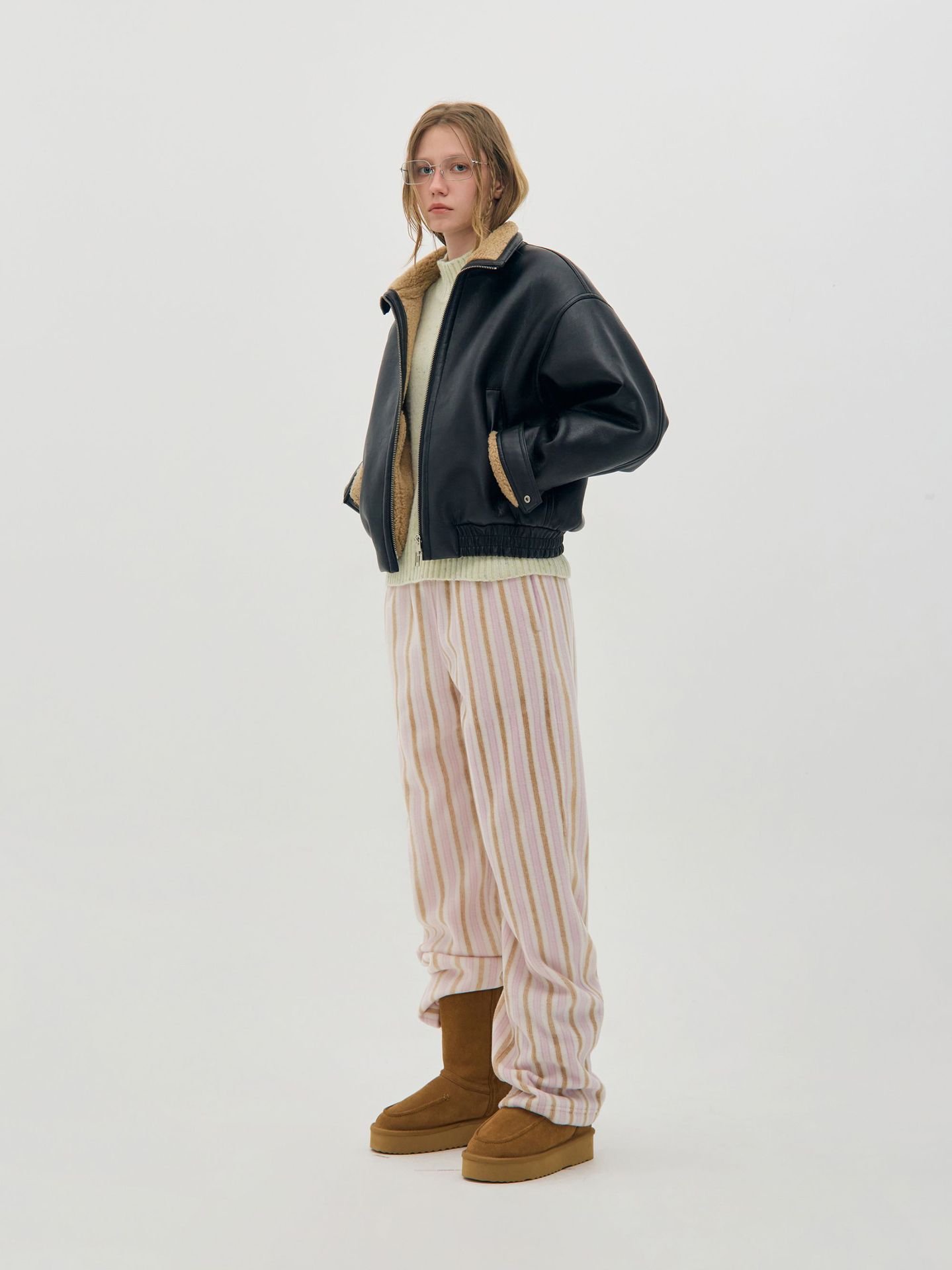 Low clas * ic革の女性秋冬の新型羊の毛は保温して厚いダブルヘッドのファスナーのファッションのジャケットを厚くします。