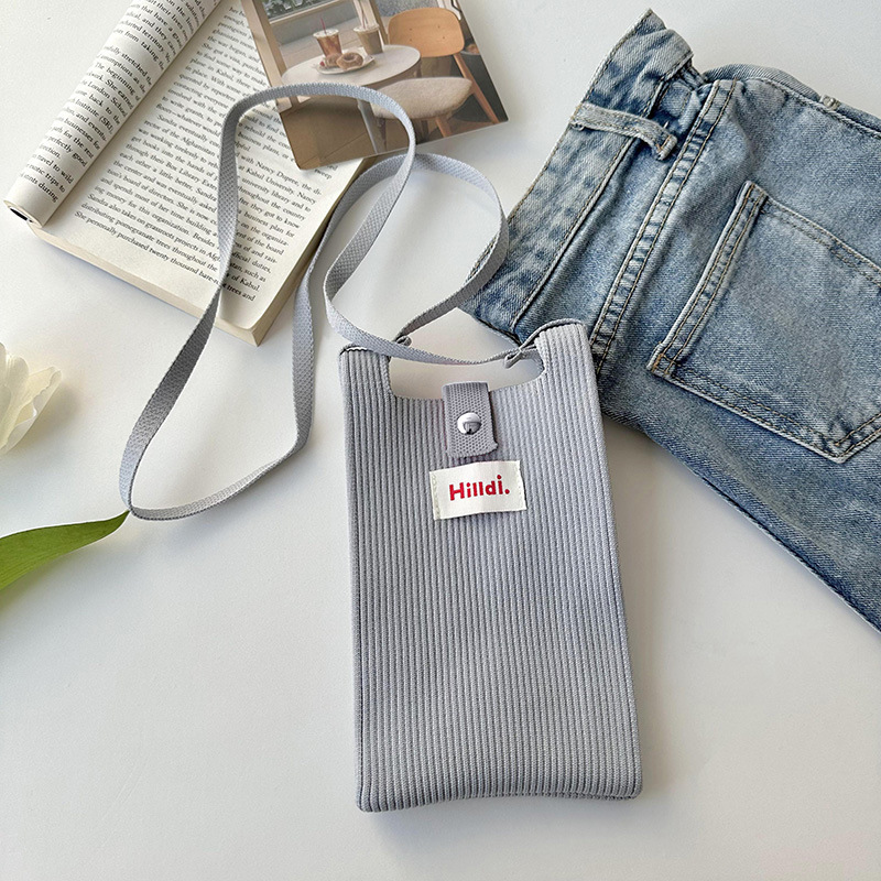 Primavera nuevo color sólido de punto de hombro mochila bolso móvil de moda versátil bolso de dopamina para hombres y mujeres