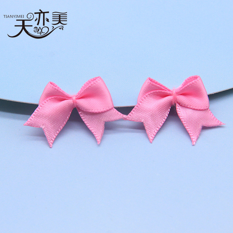 Cinta en stock cinta pequeño arco textil accesorios Rosa cola de milano cinta arco 100
