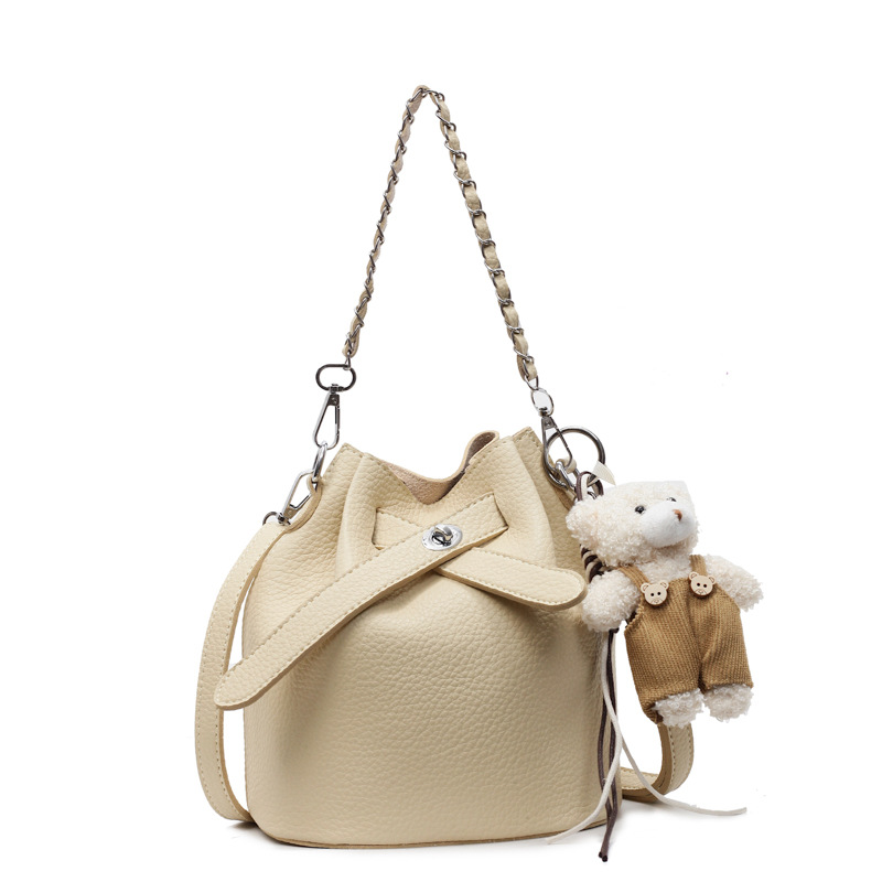 2025 nuevo estilo estilo caliente bolso de cubo coreano bolso de hombro de alto valor para mujer bolso de mensajero simple casual de todo fósforo