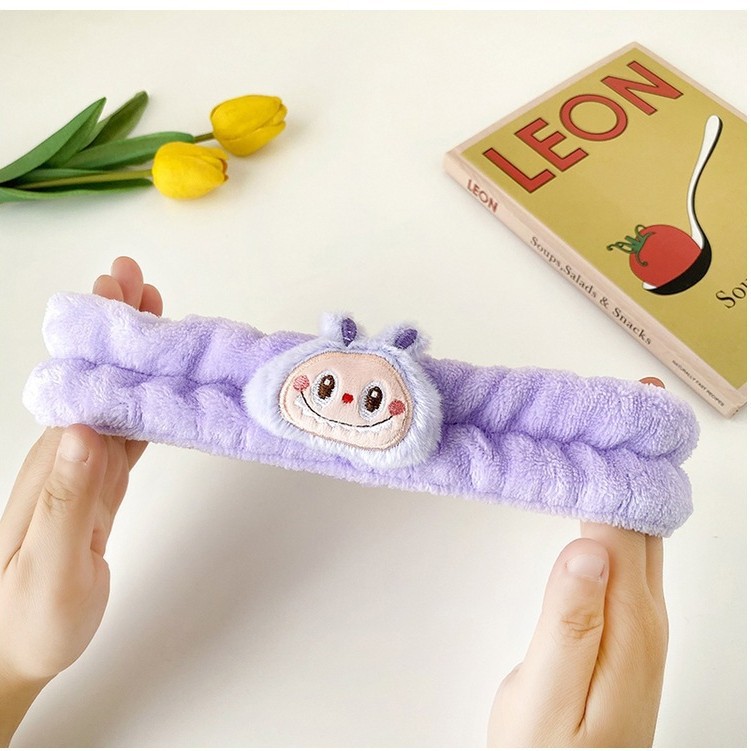 Nuevos dibujos animados tela de tela correa de pelo al por mayor extraña peluche lavado facial maquillaje de tela de tela de tela de banda de mariposa final de cabello de chicas