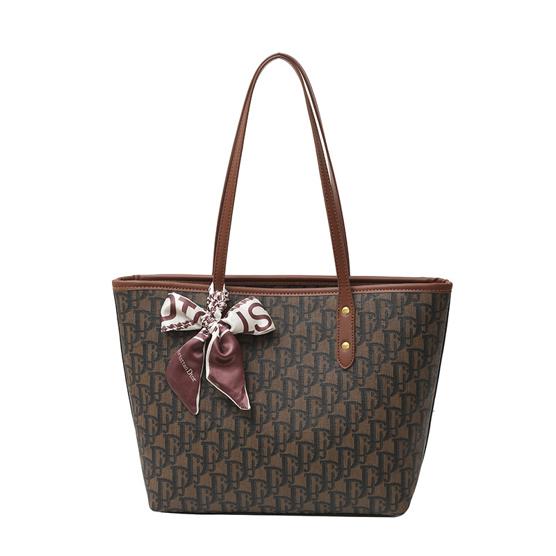 Bolso para mujeres 2025 nuevo retro alta textura versátil bolso de hombro impresa de gran capacidad de letras bolso de viaje