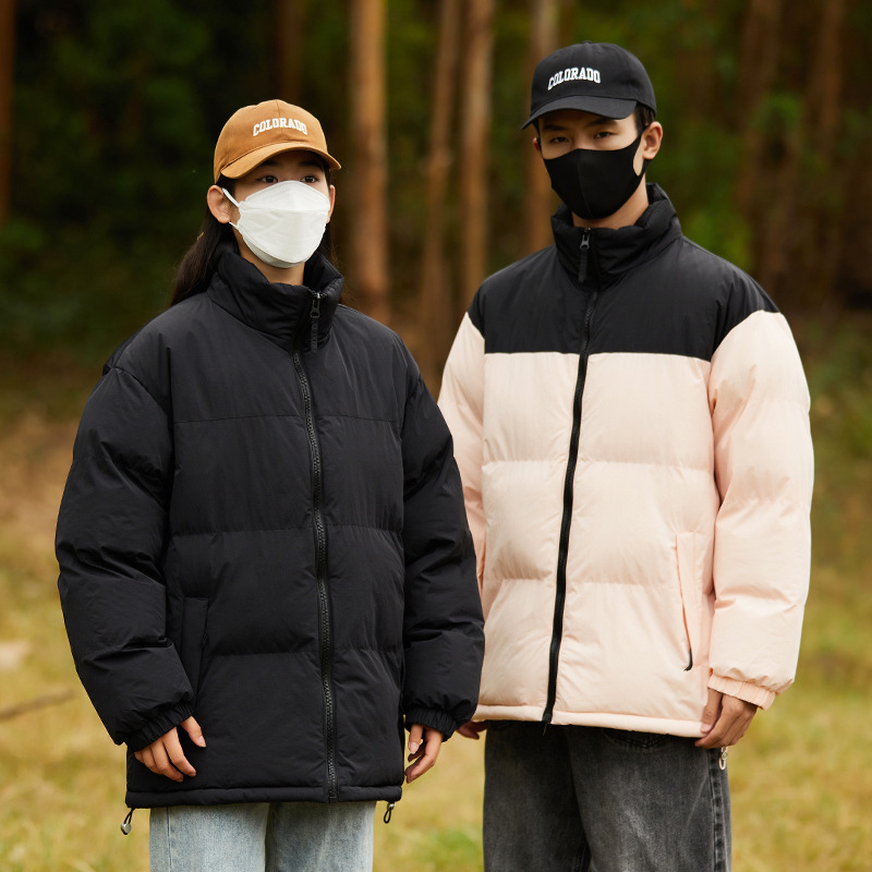 2024 hombres y mujeres invierno chaqueta de algodón de gran tamaño pareja tendencia deportiva gruesa calentamiento chaqueta de pan al por mayor