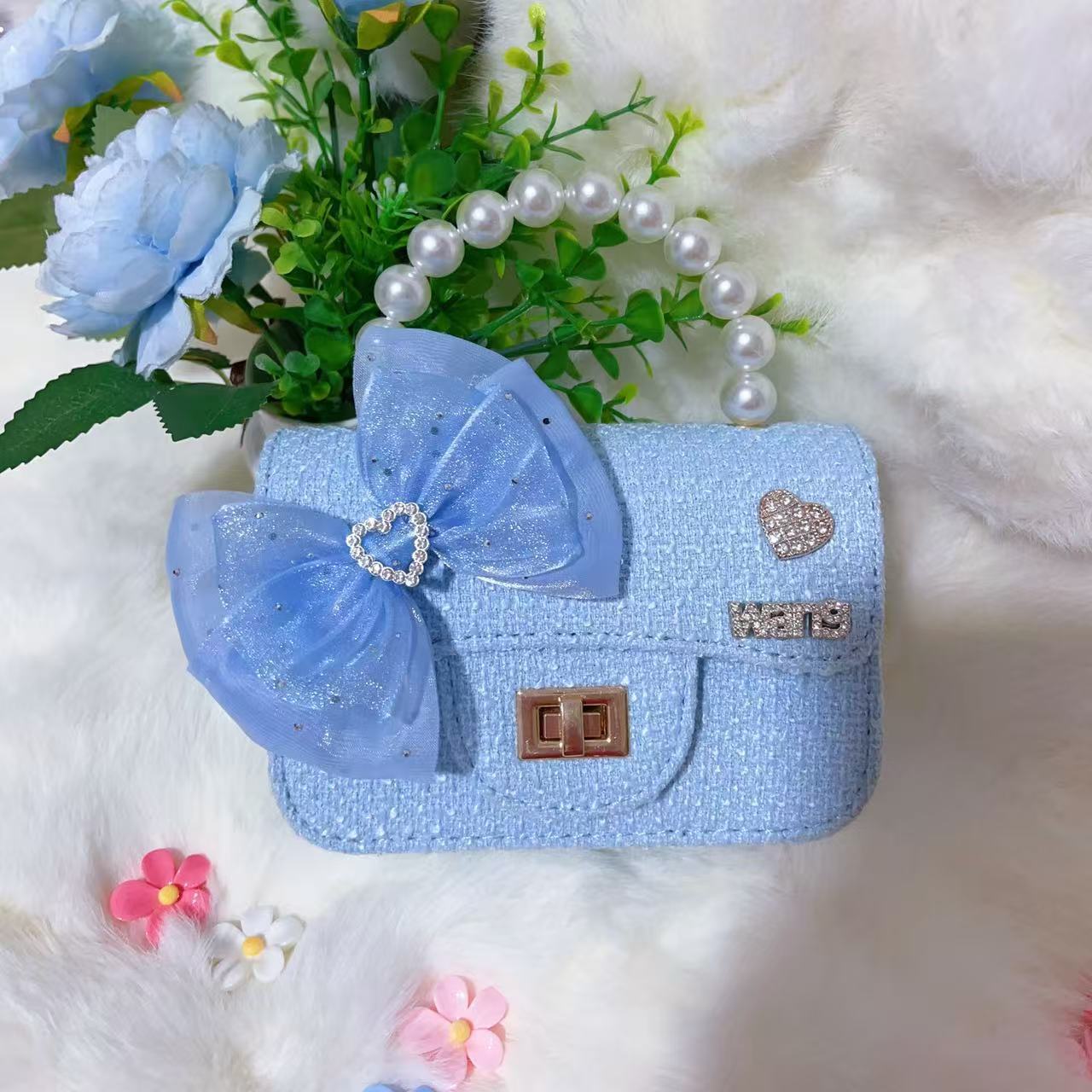 Nuevo tipo de bolsos para niños, bolsos de moda, bolsos de princesa de viento, bolsos portátiles lindos para chicas, bolsos de red para bebés.