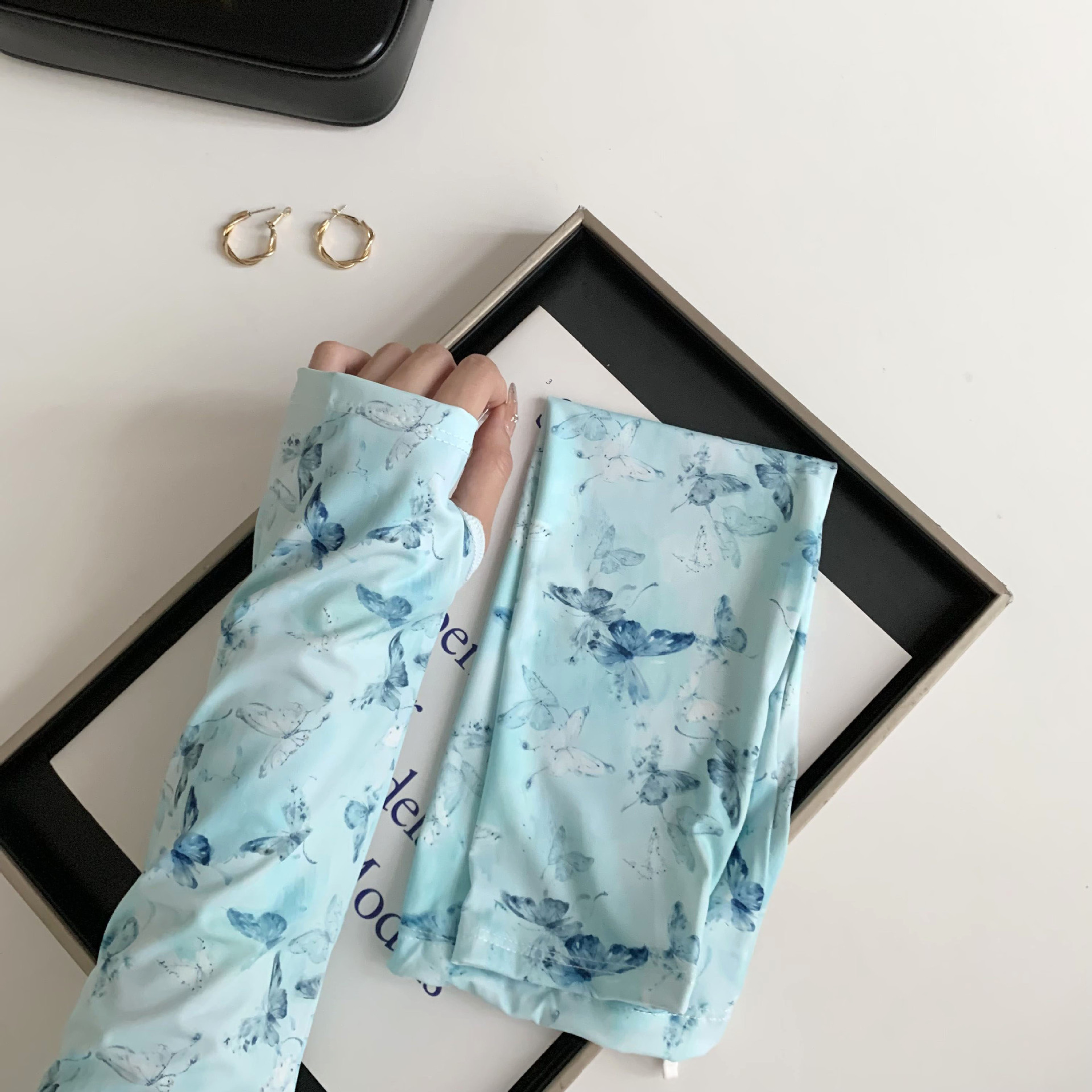 Protector solar manga de hielo manga de seda de hielo nuevo estilo nacional protección UV flor cordón manga de hielo protector de brazo transpirable suelto