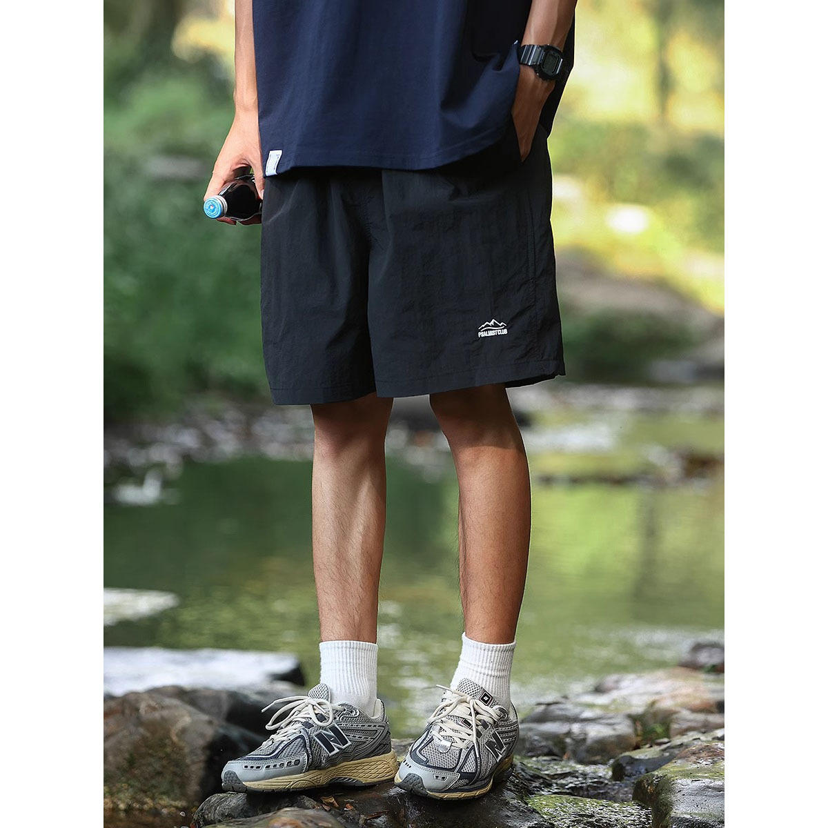 Verano al aire libre montañas y ríos pantalones cortos de color sólido para hombres pantalones de cinco puntos de playa sueltos de secado rápido comercio exterior al por mayor transfronterizo
