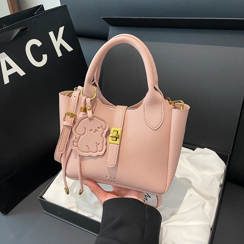 Bolsa de cubo portátil con patrón de lichi para mujer 2025 nueva moda urbana