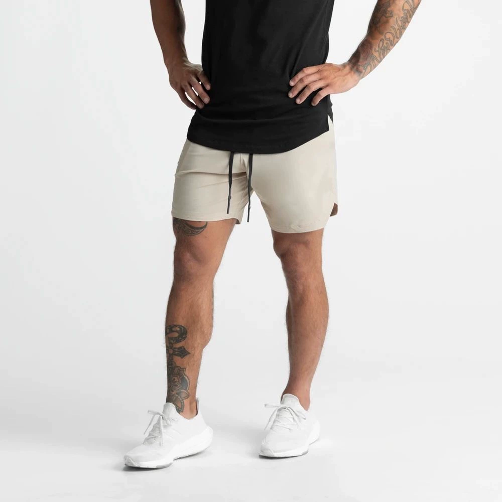 Pantalones cortos deportivos para hombre de cinco cuartos
