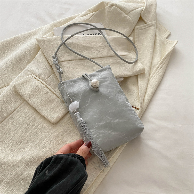 Nueva bolso chino para mujeres 2024 verano nuevo estilo nacional bolso de mano pequeño bolso ligero con cheongsam perla bolso móvil