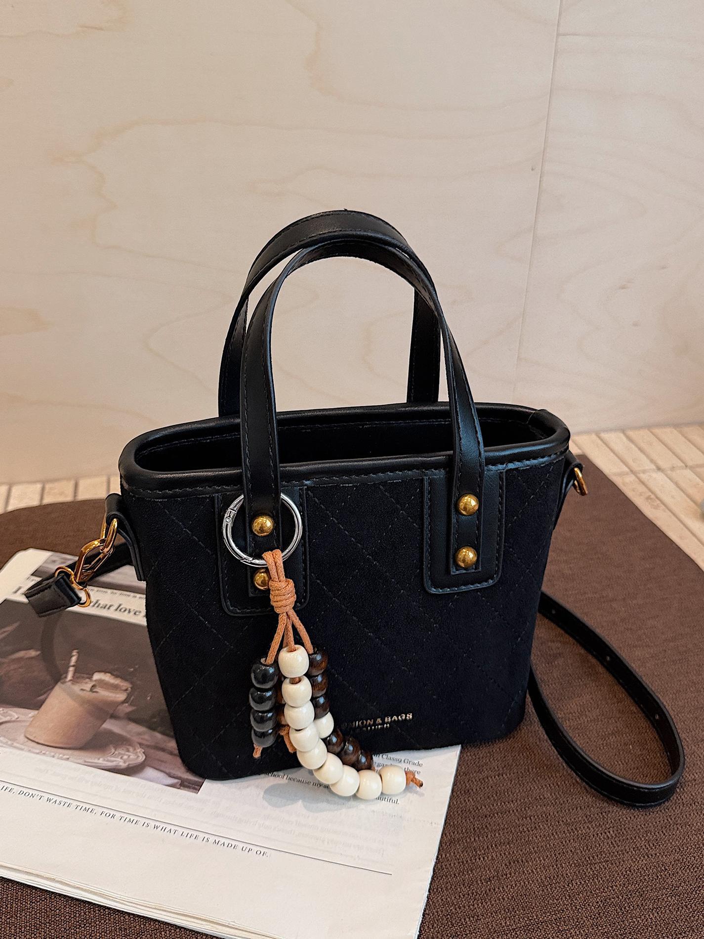 Transfronterizo retro gamuz bolsas de cubo de mano para mujeres 2025 nuevo estilo universal