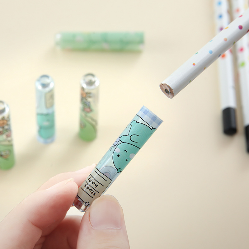 Dinosaurio pequeño fresco y transparente tapa de lápiz dibujos animados lindo puerco puerta permanente pequeño bolígrafo cubierto extensor de bolígrafo papelería