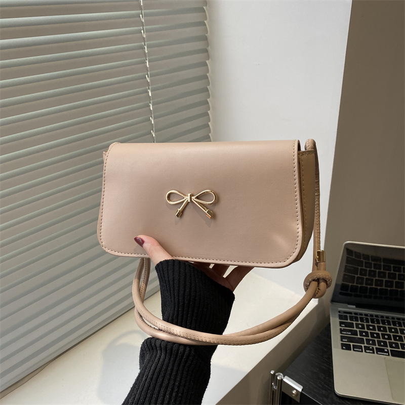 2025 verano nuevo estilo nicho bolso de axila moda femenina bolso cuadrado pequeño portátil ins bolso de hombro de estilo occidental