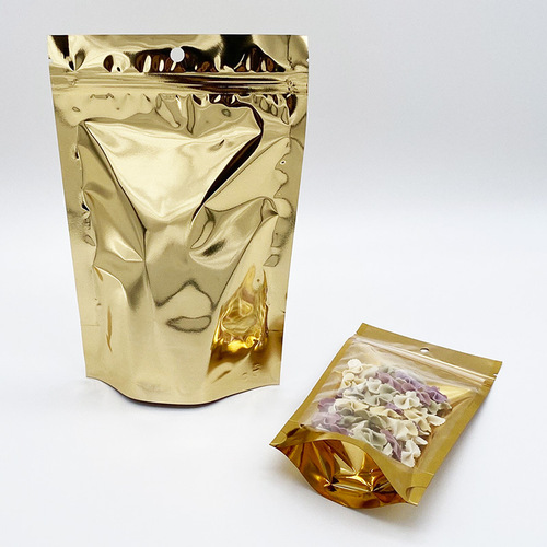 Factory direct supply of golden yin and yang self-standing bags, aluminum foil ziplock bags, grain tea packaging bags, snack food pull-out bags