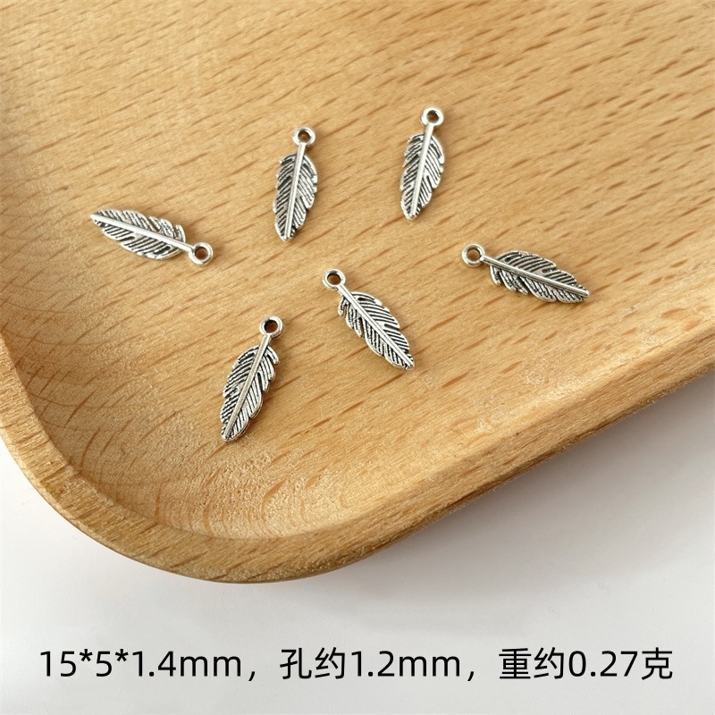 Small feather [ancient silver]