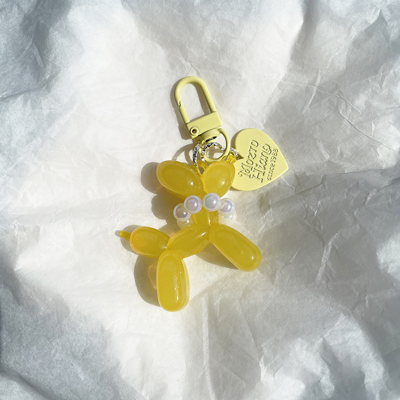 Pequeño Libro Rojo mismo lindo jalea globo láser perro llavero colgante colorido cachorro de dibujos animados teléfono llavero