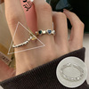 Retro fashionable ring, silver 925 sample, on index finger