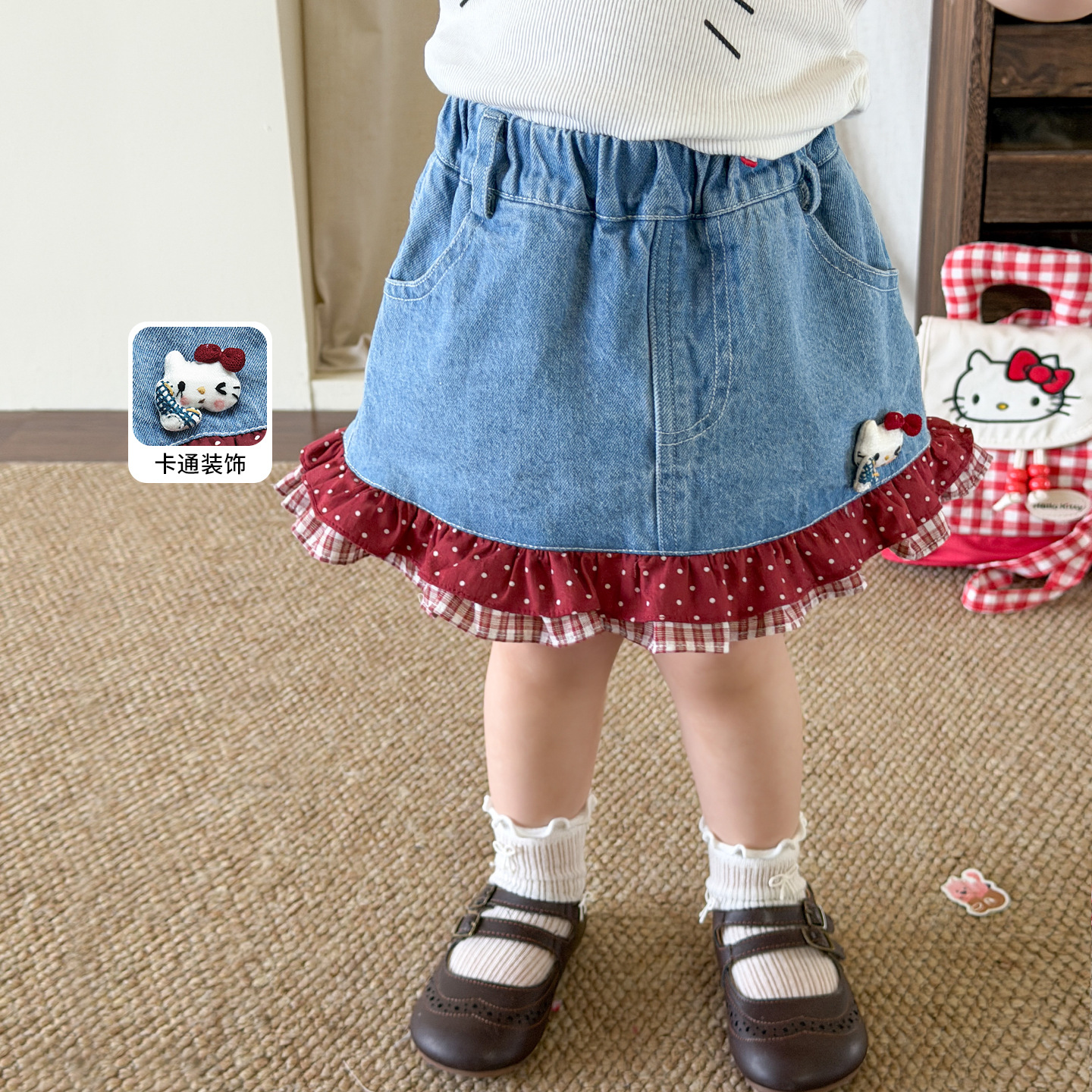 Caña de azúcar de pera ropa infantil niñas falda delgada verano 2026 falda de niños clase A bolsa de bebés falda corta de vaqueros