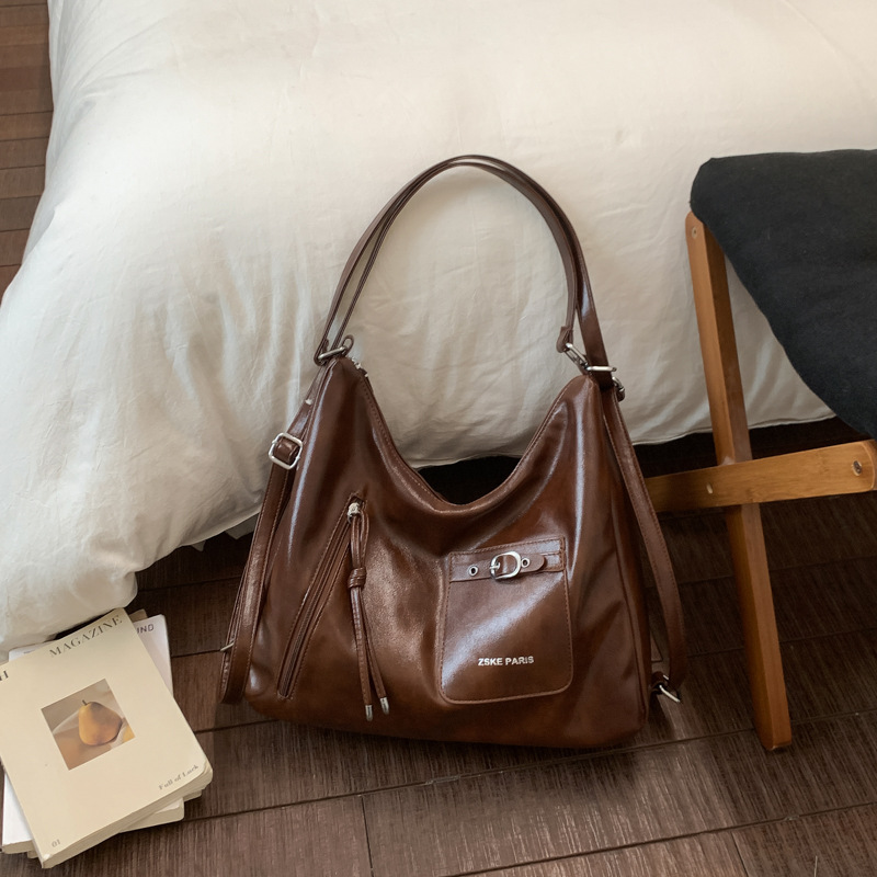 Bolsas de tendencia transfronteriza de gran capacidad para mujeres 2026 nueva moda coreana multipropósito mochila de viaje ocio bolsa de mano image 15