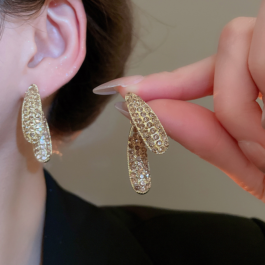 Pendientes de flor de lazo elegante de súper hada de plata Pendientes de moda de lujo ligero francés Pendientes de todo fósforo dulce de estilo literario