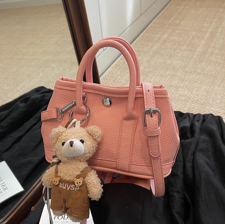 Bolsa de cubo de mano popular de verano para mujeres 2025 nuevo bolso de hombro super caliente universal nicho super caliente mochila