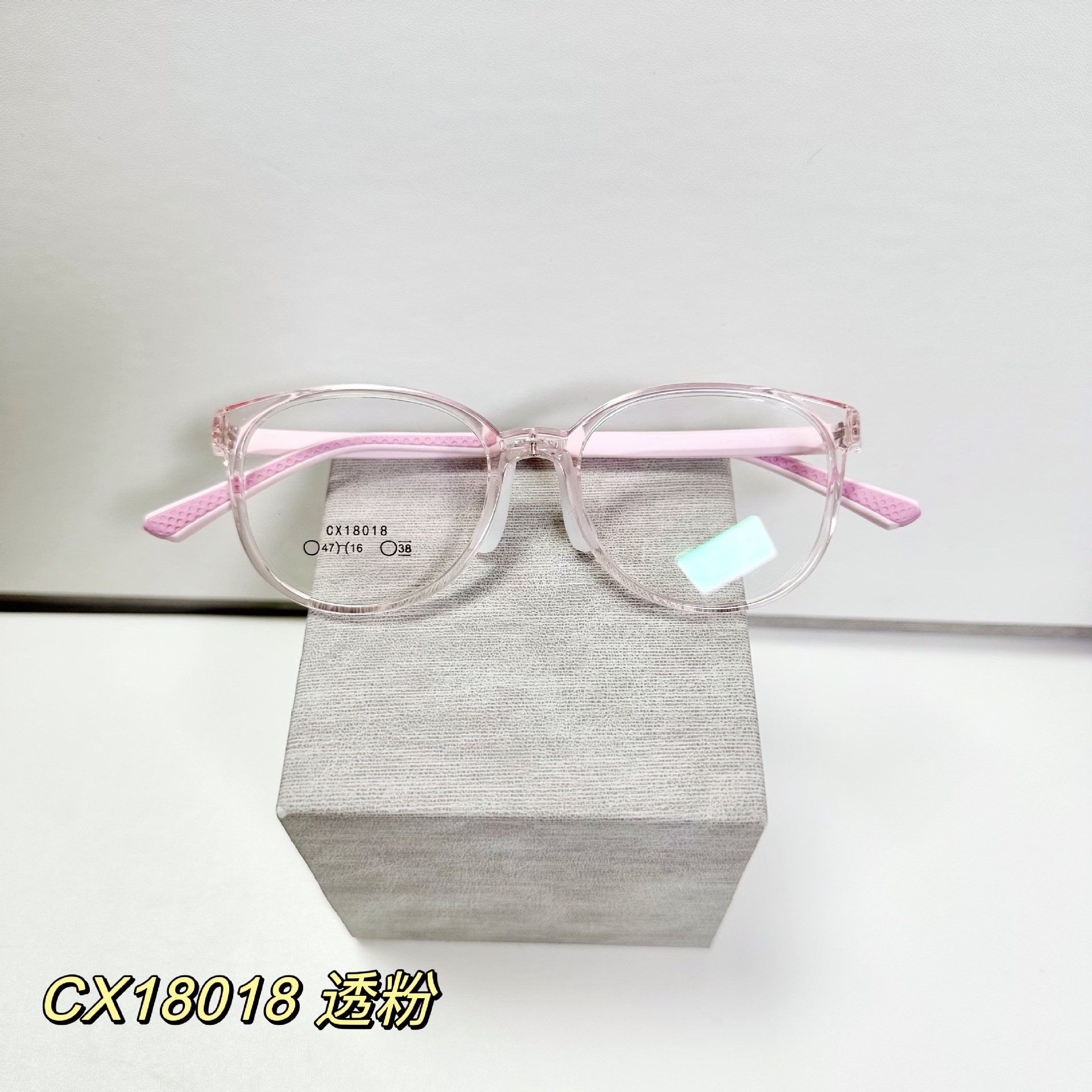 Montura de gafas infantiles translúcidas de color morado con almohadillas nasales de silicona ajustables, se pueden adaptar con lentes graduadas, venta al por mayor desde Danyang.