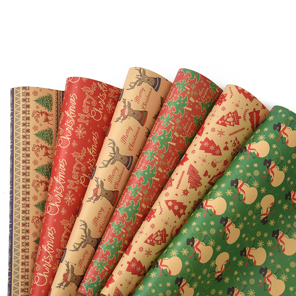 Nuevo papel de regalo de Navidad transfronterizo papel de kraft retro árbol de Navidad copo de nieve muñeco de nieve día embalaje de regalo papel de regalo