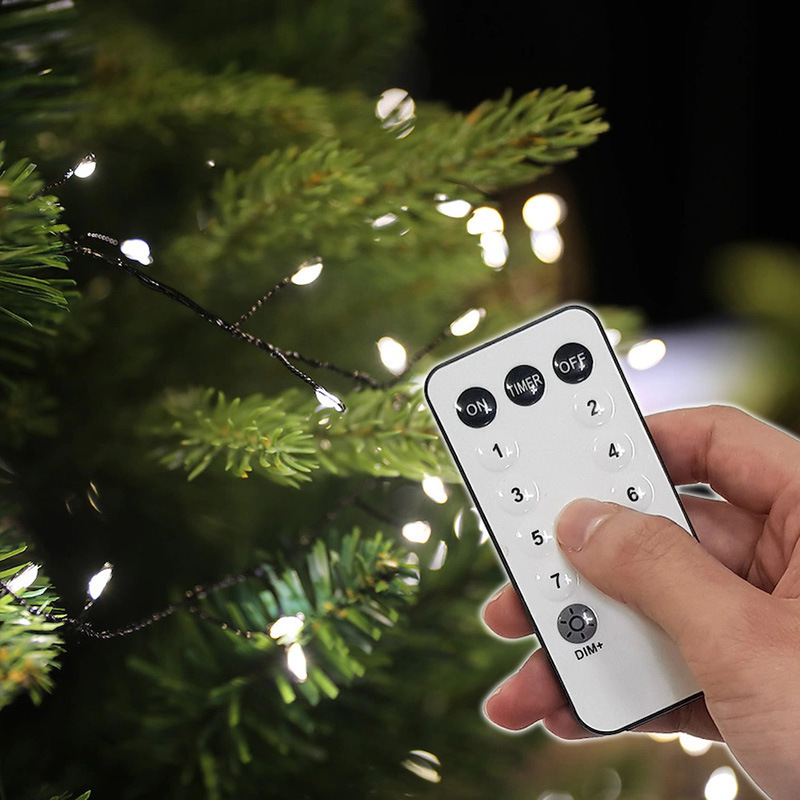 Decoración navideña LED Control remoto Cable verde oculto de baja tensión Lámpara de cobre Decoración navideña Lámpara de petardos Lámpara de árbol de Navidad Cadena de luces