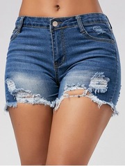 Cross-border supply of European and American foreign trade ripped monkey tassel denim shorts for women